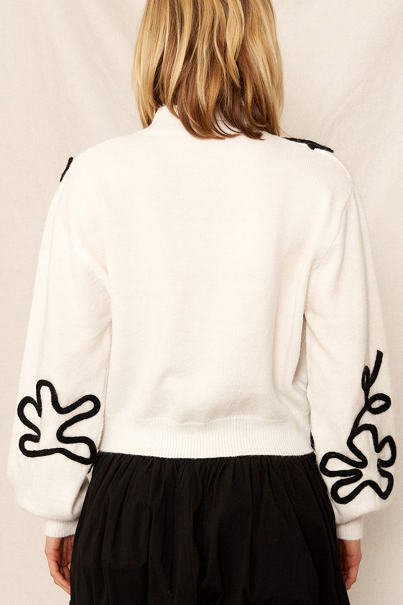 White & Black Floral Mock Neck Sweater